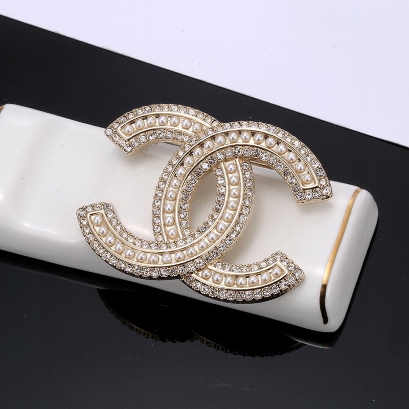 Ch**el brooches
